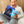 Load image into Gallery viewer, boy missing tooth with blue tooth pillow and adventure book
